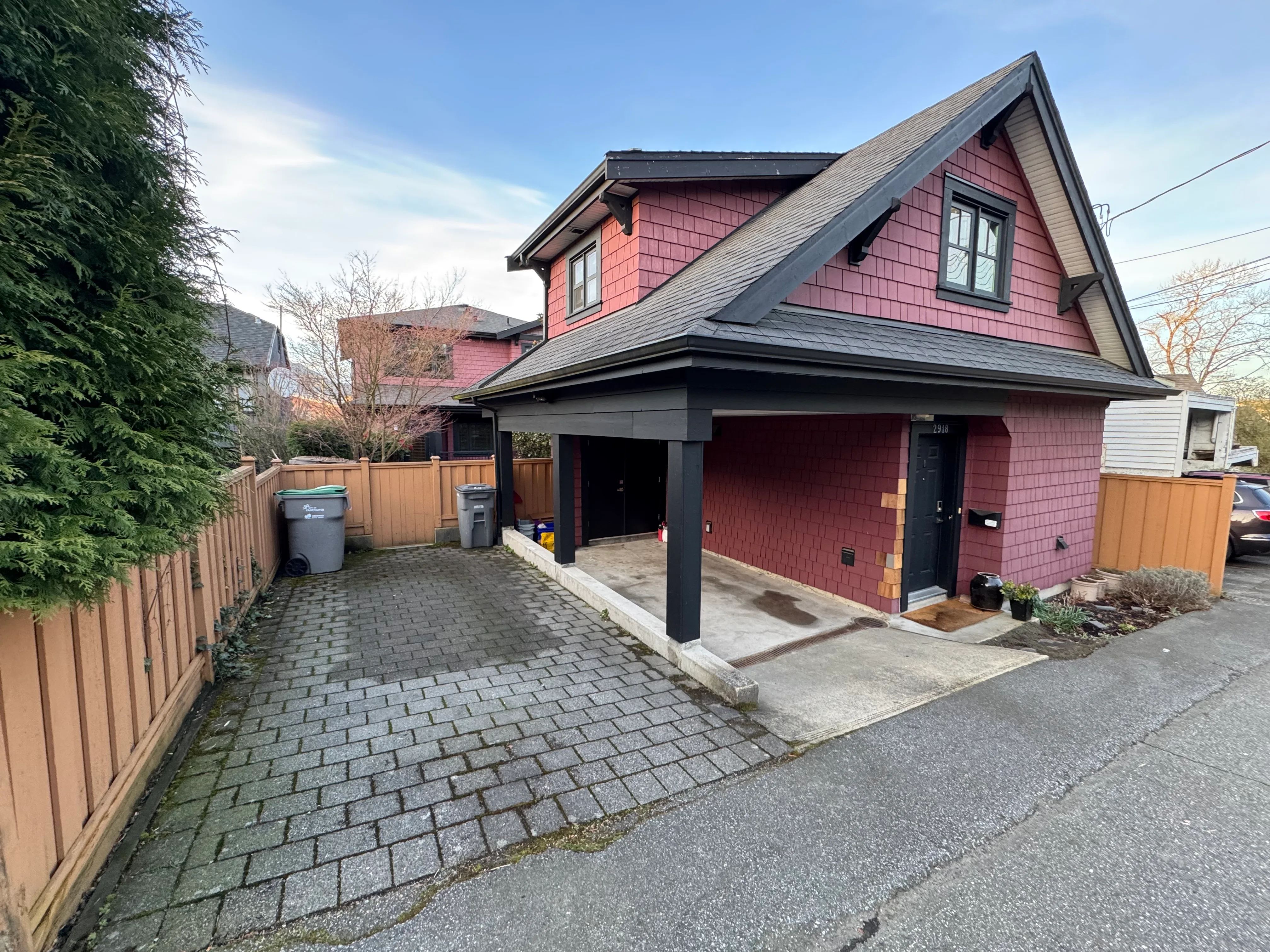Approach from the laneway with covered parking