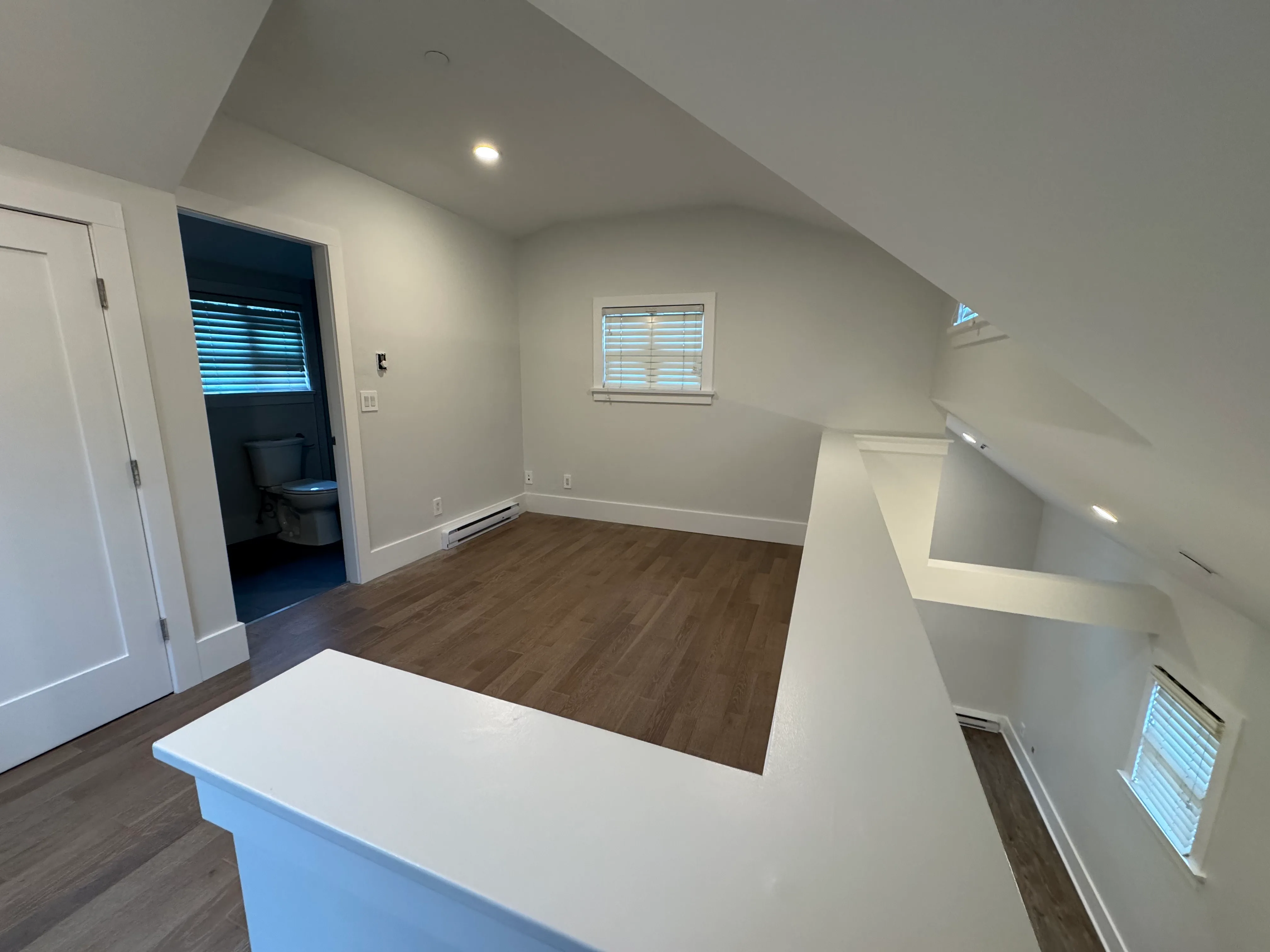 Loft bedroom with ensuite bathroom